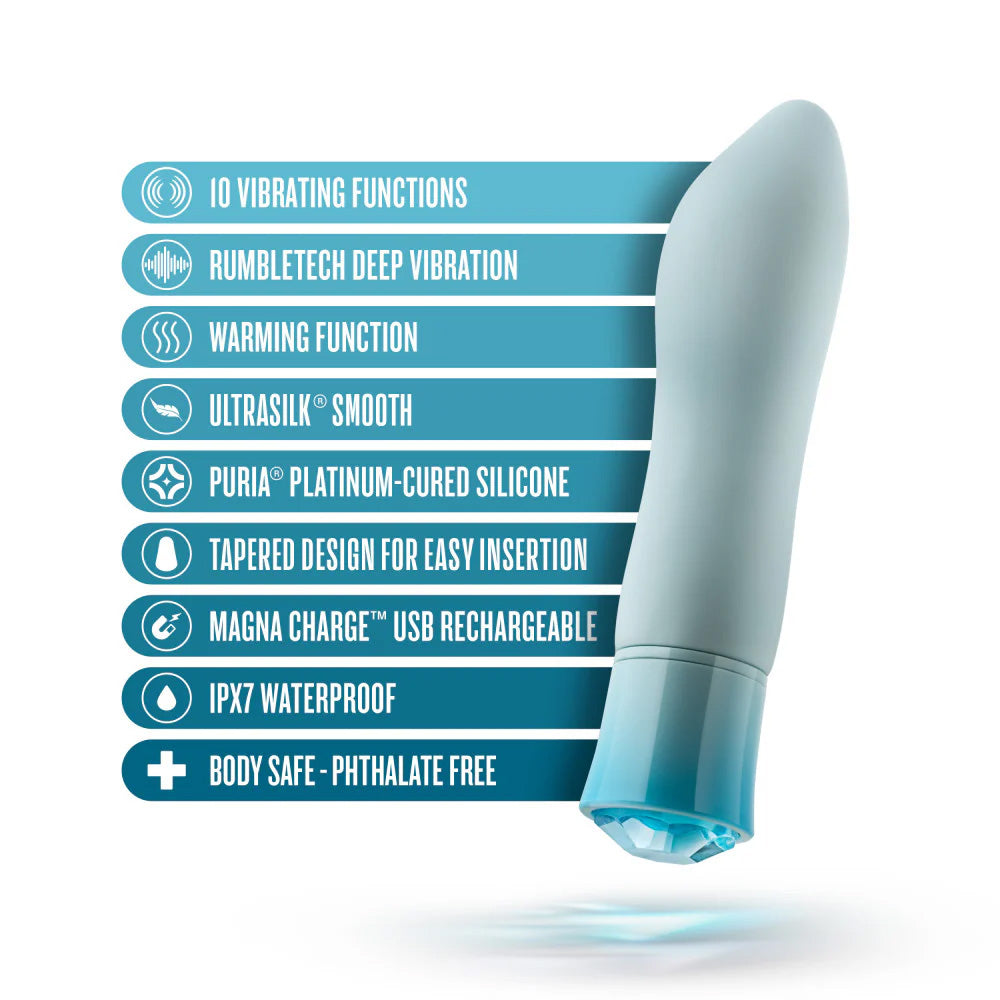 Feature breakdown of the Singapore Blush Oh My Gem vibrator in cool blue, highlighting 10 vibration modes, warming function, UltraSilk® smooth silicone, and a tapered tip—designed for easy, affirming pleasure across queer and trans bodies.