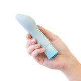 Hand holding the Singapore Blush Oh My Gem blue edition, demonstrating compact size and silky texture—ideal for discreet storage, easy grip, and comfortable use for queer individuals of all experience levels.