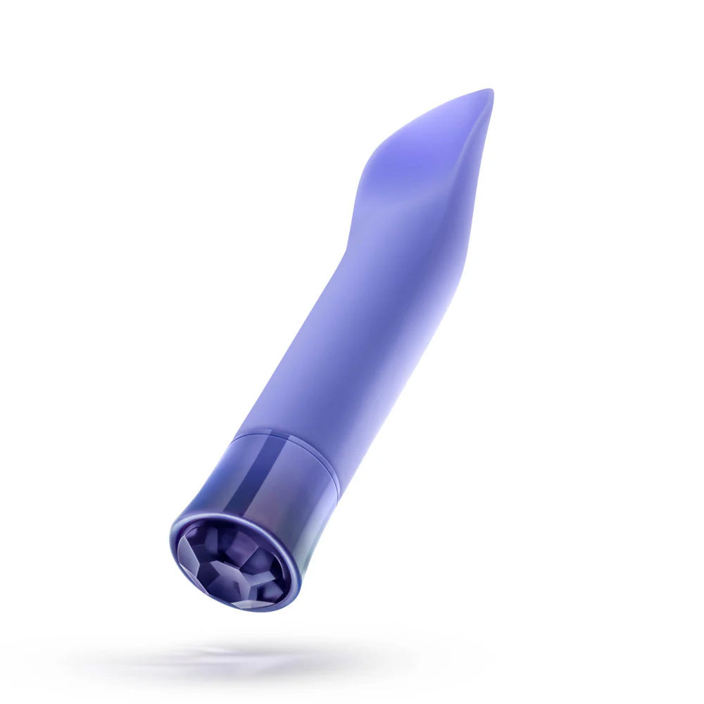 Angled view of the Singapore Blush Oh My Gem lavender vibrator showing its soft silicone shaft and gemstone-inspired base, blending beauty and power for trans masc and femme-aligned users alike.