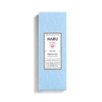 Pastel blue packaging of HARU Nude glycerin-free lubricant, crafted for fertility-focused couples and sensitive skin, designed to support sperm vitality and inclusive intimacy care.