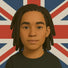 Digital illustration of a tomboy with medium-length locs and soft expression, centered against the UK flag backdrop, celebrating queer Black identity and androgynous beauty.