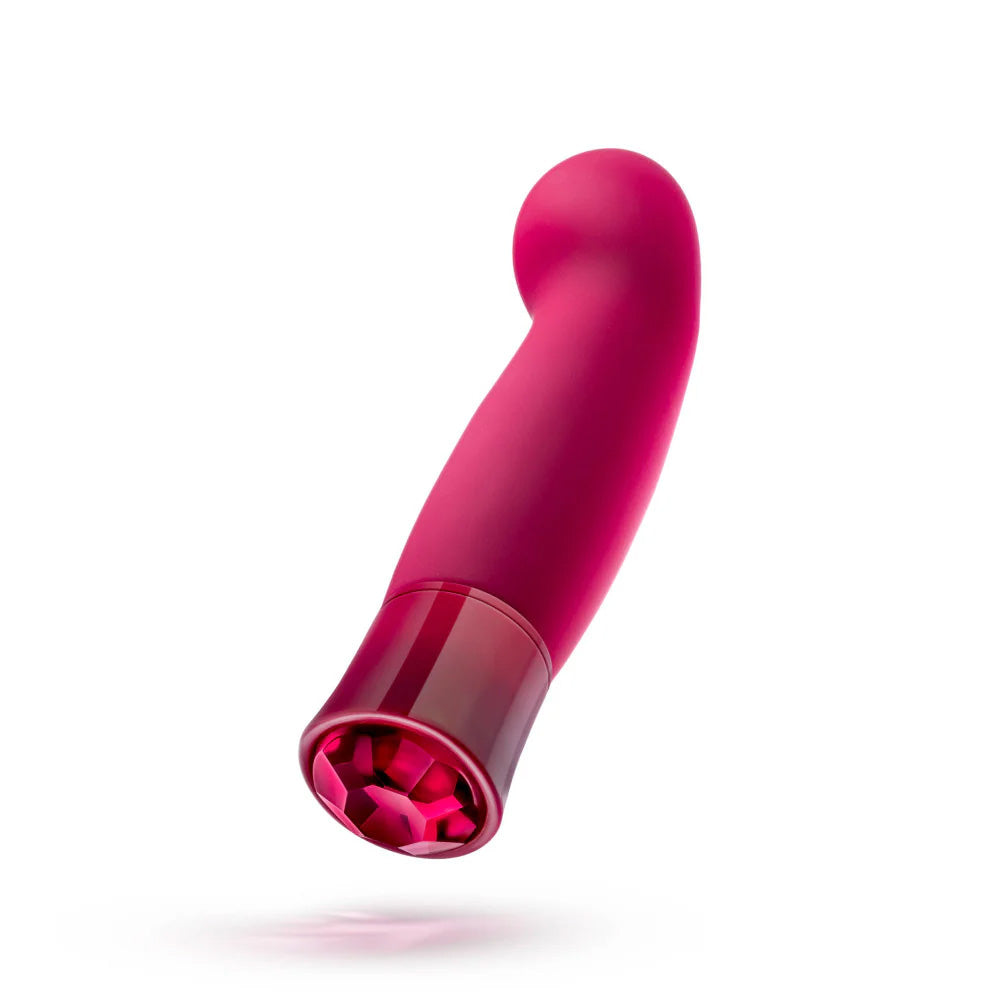 Floating image of the Singapore Blush Oh My Gem “Classy” G-spot vibe in rich red, showcasing its faceted jewel-tone base and curved silicone head—designed for intense internal pleasure with femme energy and style.