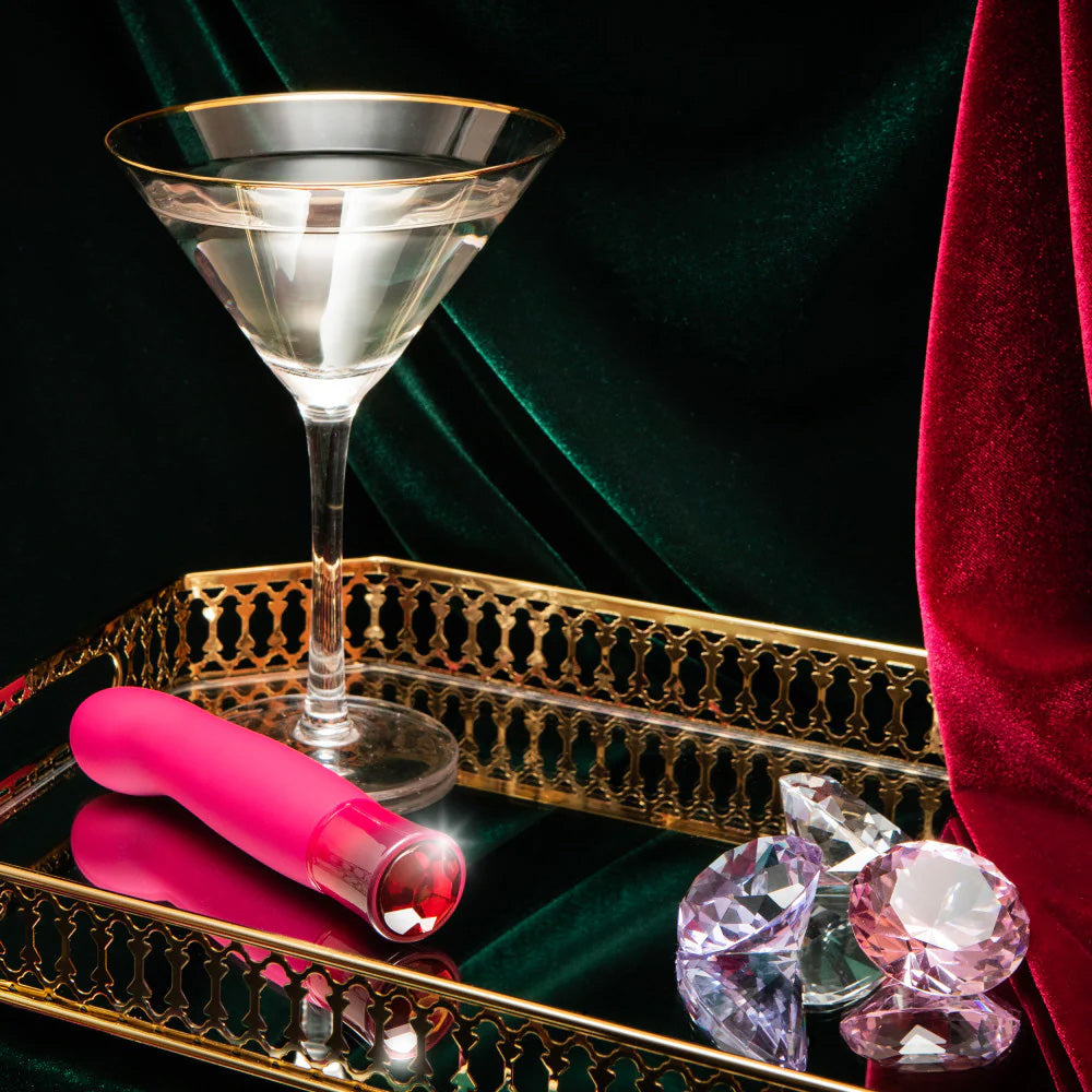 Singapore Blush Oh My Gem vibe staged on a vintage-style mirrored tray with a martini and oversized crystals—dripping in femme luxury and unapologetic queerness.