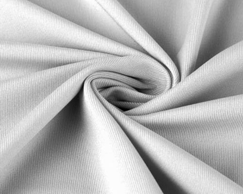 Detailed view of smooth, double-knit stretch fabric used in TOMSCOUT’s premium binder lining—soft on skin with minimal friction. Designed for FTM and gender-nonconforming individuals who value skin-safe compression, durability, and effortless binder care. Wash cold, hang dry for longevity. TOMSCOUT INSPIRED Chest Binder