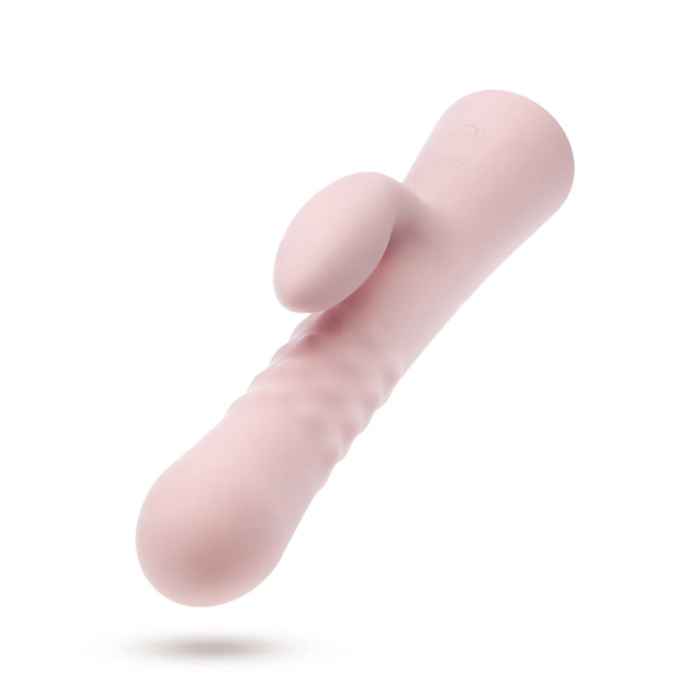 Floating product view of the Singapore Blush Jaymie from a front angle, highlighting its bulbous G-spot tip and curved clitoral arm—engineered to meet the needs of trans men and genderfluid users exploring their evolving desires.