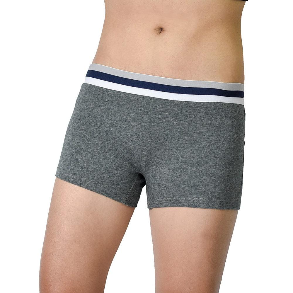Trans masc individual models TOMSCOUT’s dark grey boxer briefs featuring a clean-cut silhouette and dual-tone waistband. Soft cotton blend and gender-neutral design offer comfort, coverage, and confidence under any outfit.