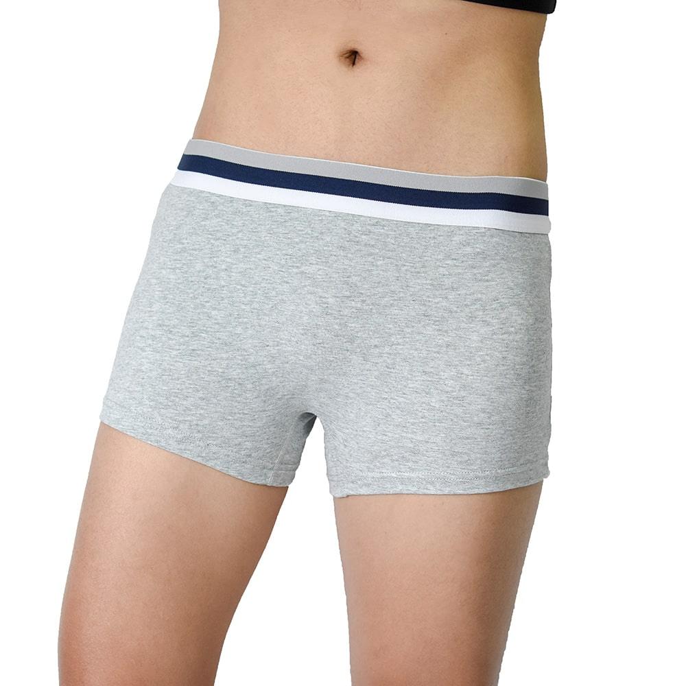 Trans masc individual models TOMSCOUT’s heather grey boxer briefs featuring a clean-cut silhouette and dual-tone waistband. Soft cotton blend and gender-neutral design offer comfort, coverage, and confidence under any outfit.