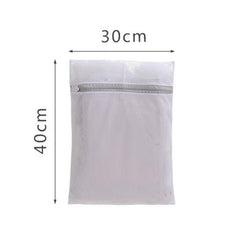 Size dimensions for the TOMSCOUT Laundry Bag, meticulously crafted for garment care: The bag is designed to accommodate various clothing sizes, ensuring thorough yet gentle washing of delicate items like chest binders and embroidered t-shirts. Durable and spacious, it's an essential accessory for sustaining the quality of your valued garments.