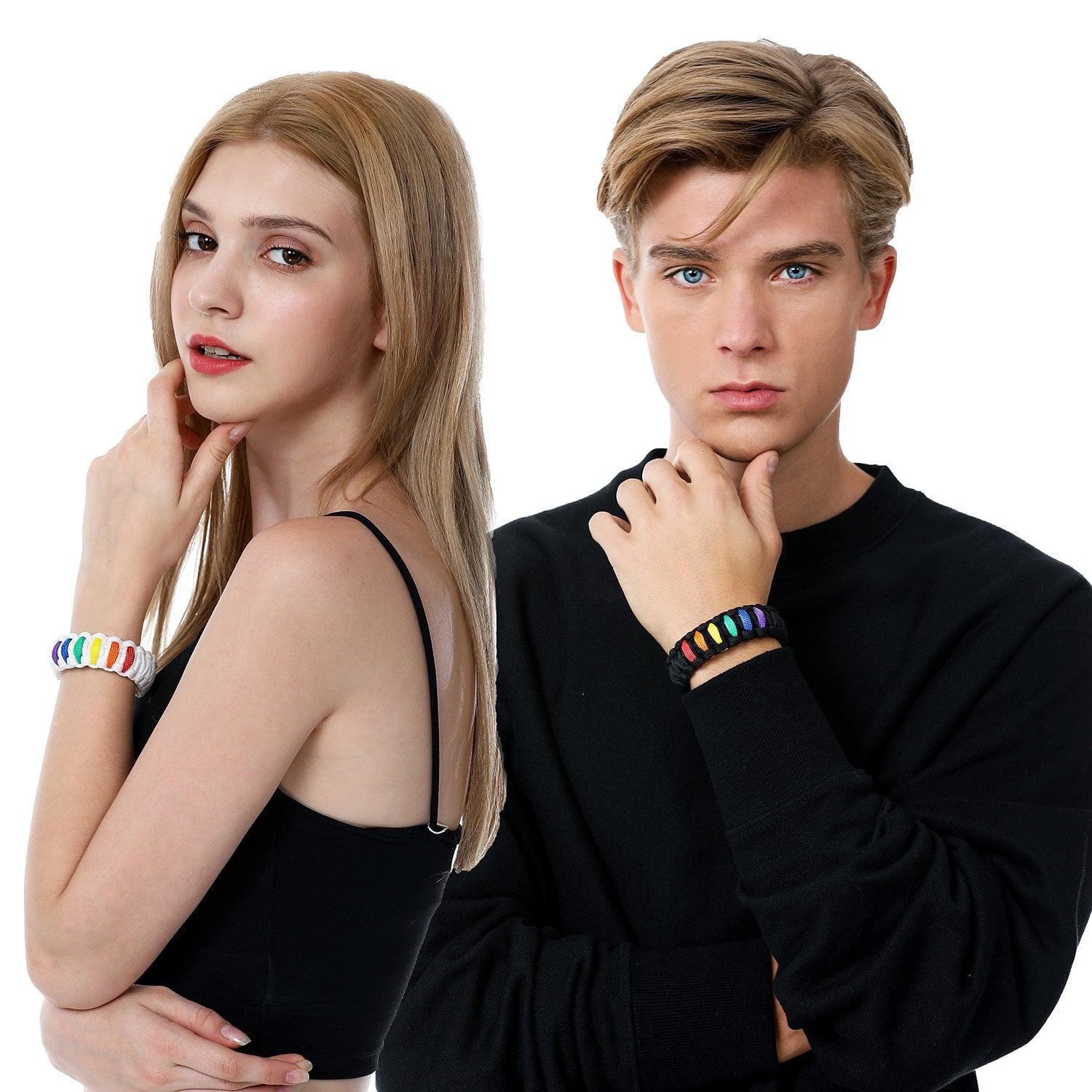 Stylish Model Wearing TOMSCOUT LGBTQ+ Pride Paracord Bracelet - Rainbow Design.