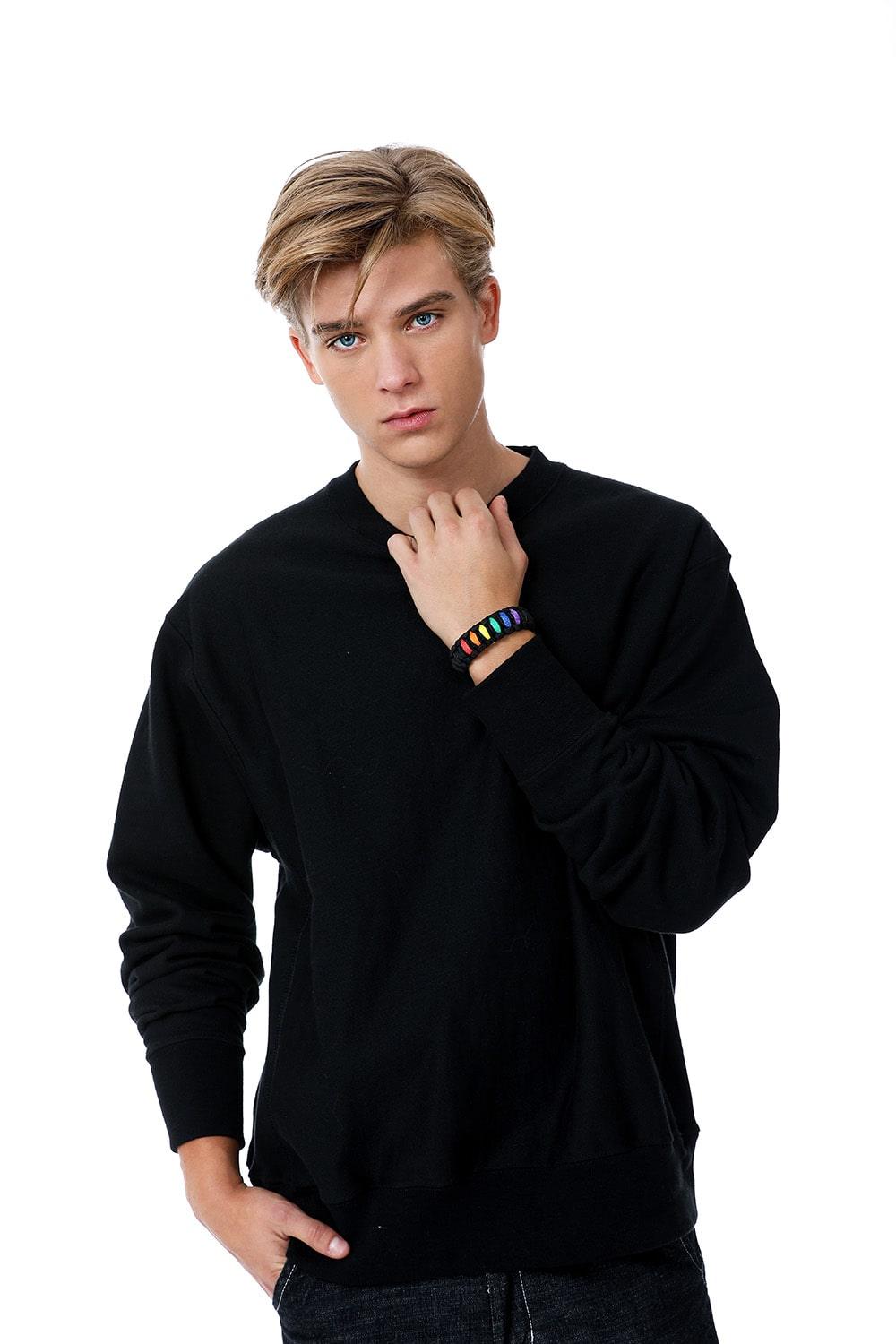 Stylish Model Wearing TOMSCOUT LGBTQ+ Pride Paracord Bracelet - Rainbow Design.