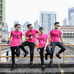 A group of Asian tomboy are wearing a hot pink t-shirt with the love wins wording at the front and holding a small pride flag. TOMSCOUT Flourish - LGBT Pride Kits (Singapore)