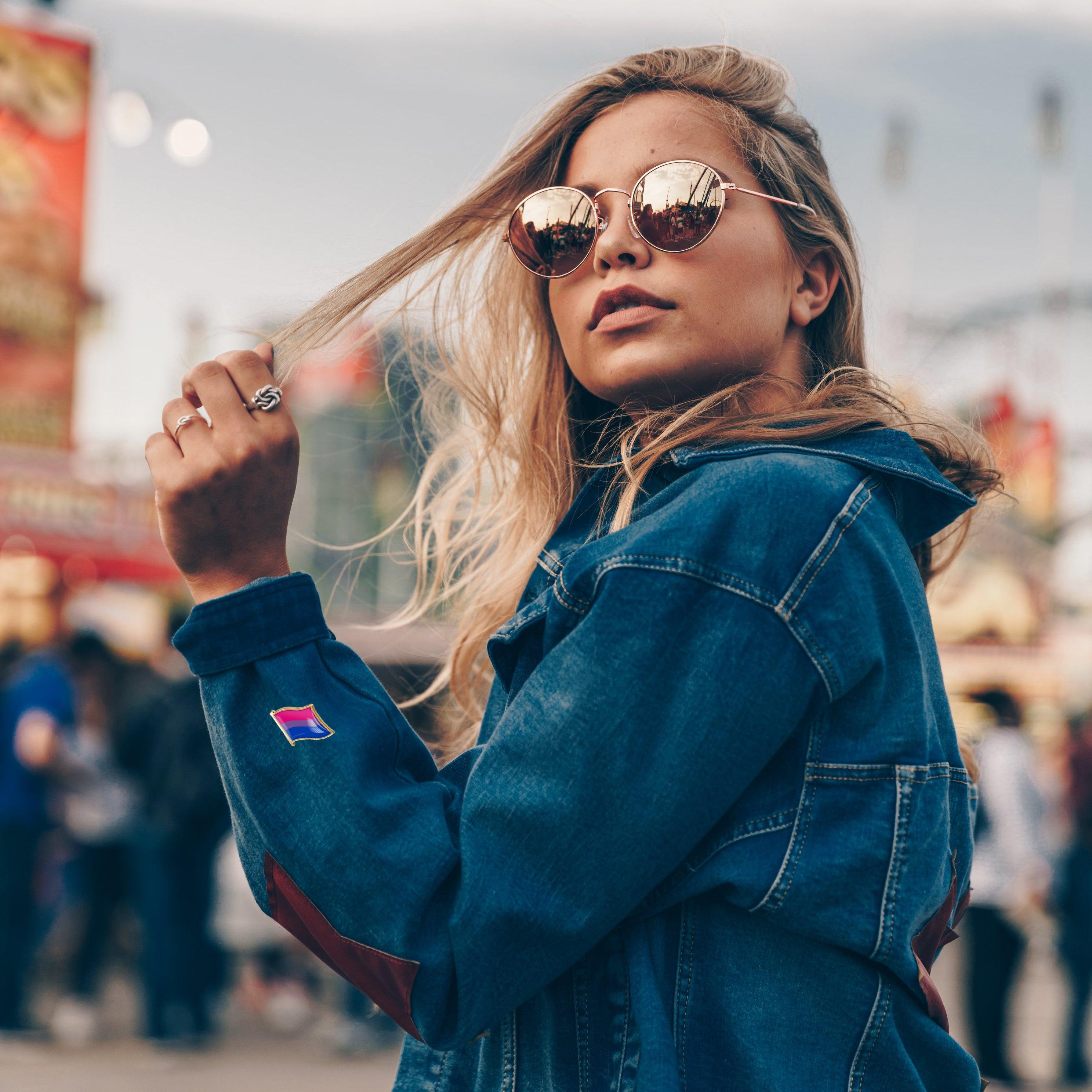 Model demonstration in the TOMSCOUT lookbook, featuring the LGBTQ+ Pride Metal Badge prominently pinned on a shirt. This image showcases the badge as a proud symbol of identity and solidarity within the LGBT community, perfect for transgender men, non-binary individuals, and tomboys in Singapore seeking to visibly express their pride and connection.